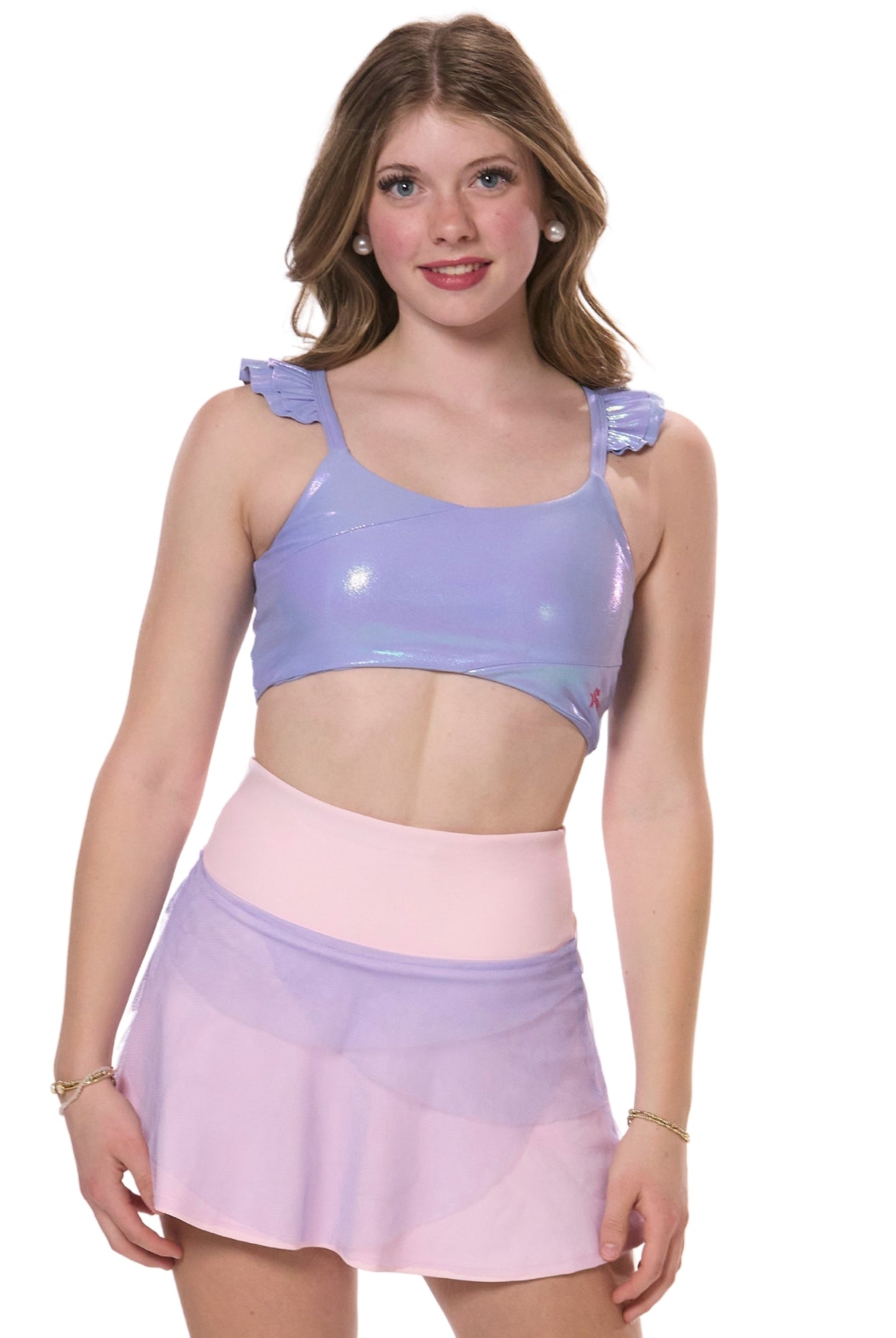 flare tennis skirt styled with metallic sports bra front view