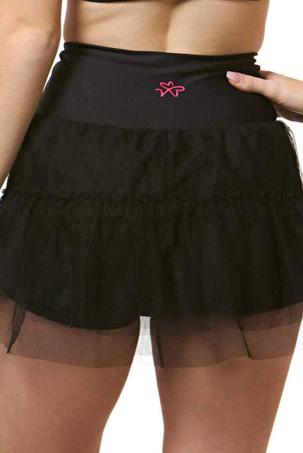 black tennis skirt for girls with built-in shorts back view