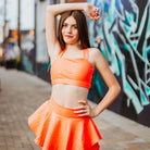 hot orange sports bra and orange skirt, tangerine crocodile print