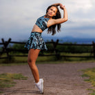 blue snakeskin v-neck crop top and skirt