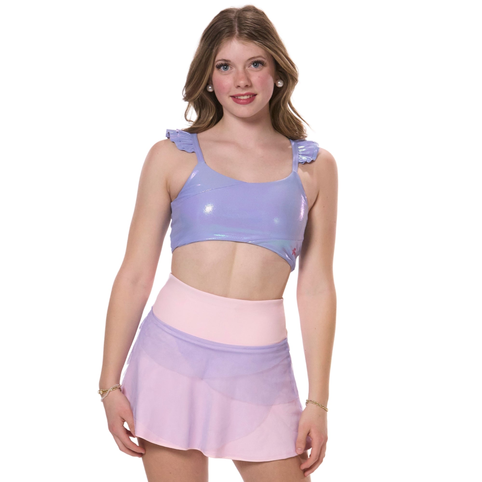 flare tennis skirt styled with metallic sports bra front view