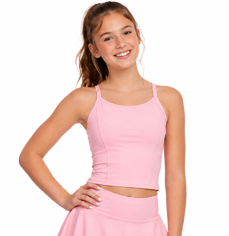 Girl wearing pink En Pointe Tank with Classic Tennis Skirt, front view tennis outfit with built-in shorts